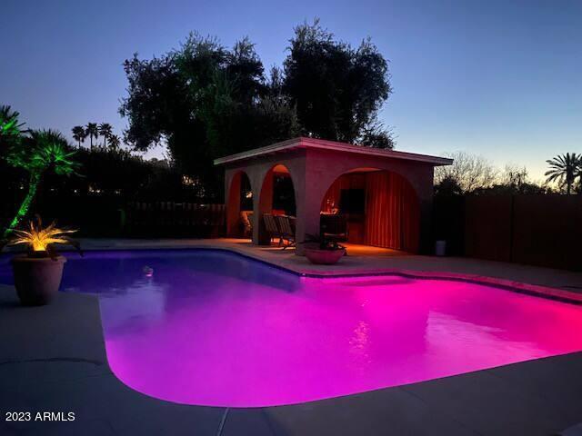 11222 North Miller Road Scottsdale, AZ 85260 - Photo 8 of 32 a view of swimming pool with a table and chairs