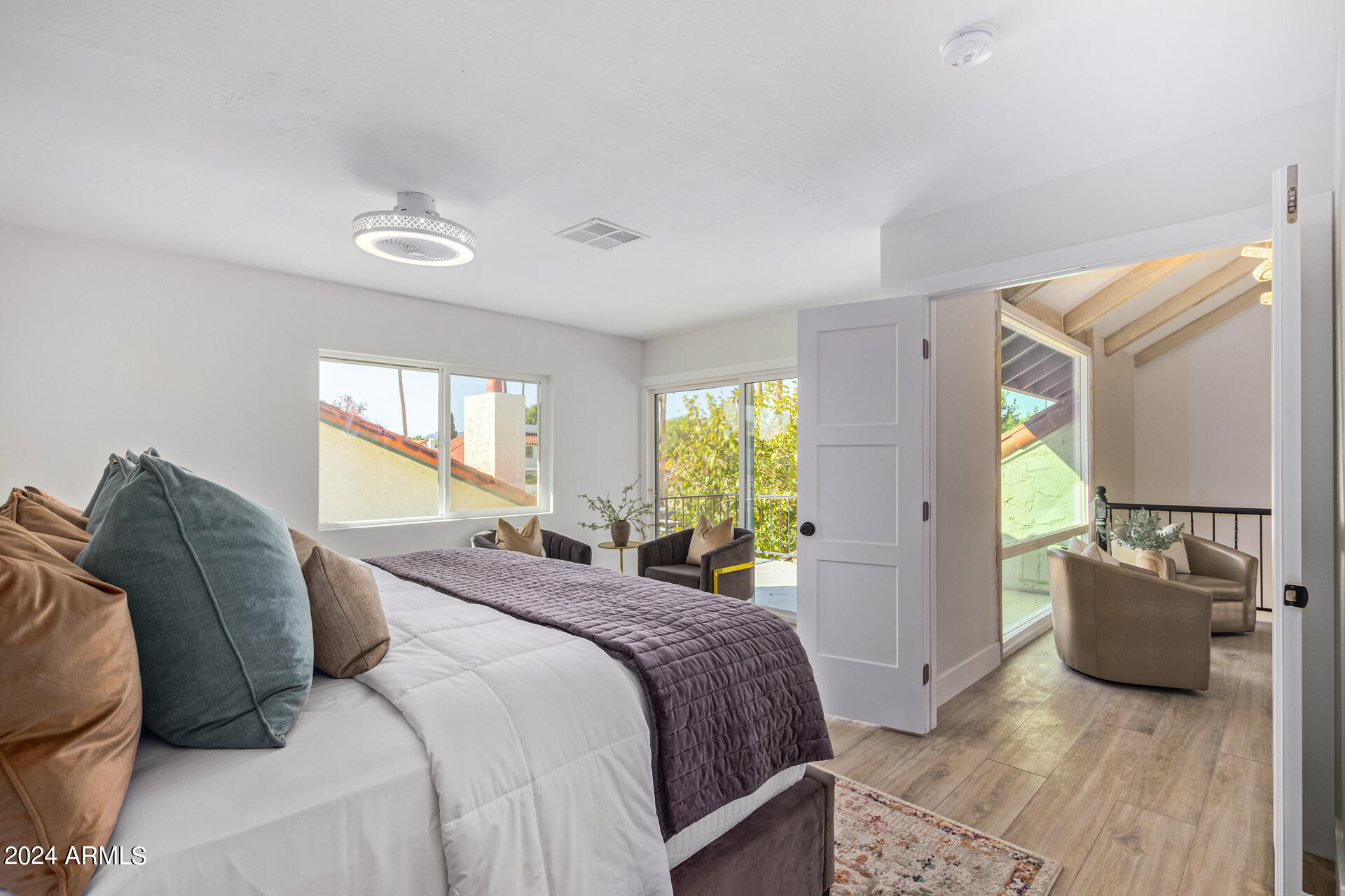 5712 North Scottsdale Road Paradise Valley, AZ 85253 - Photo 16 of 34 a bedroom with a bed and window