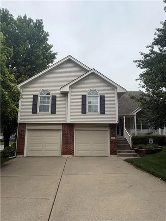 $385,000 | 212 Southeast Bingham Drive, Lee's Summit, MO 64063