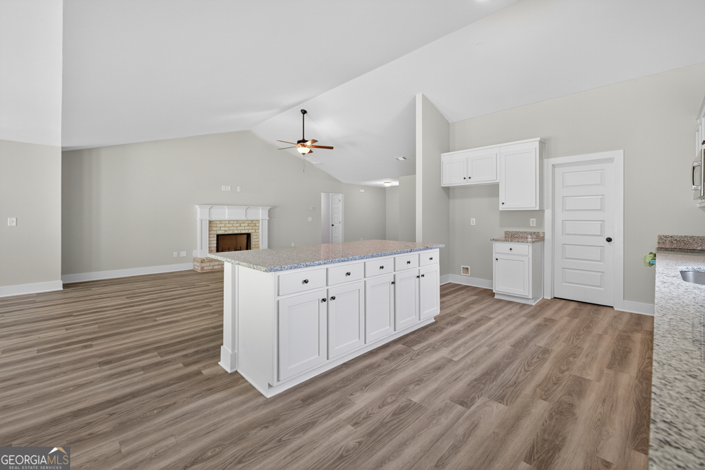 474 Oil Mill Road, Unit 11 Martin, GA 30557 - Photo 11 of 30 a view of a kitchen with wooden floor