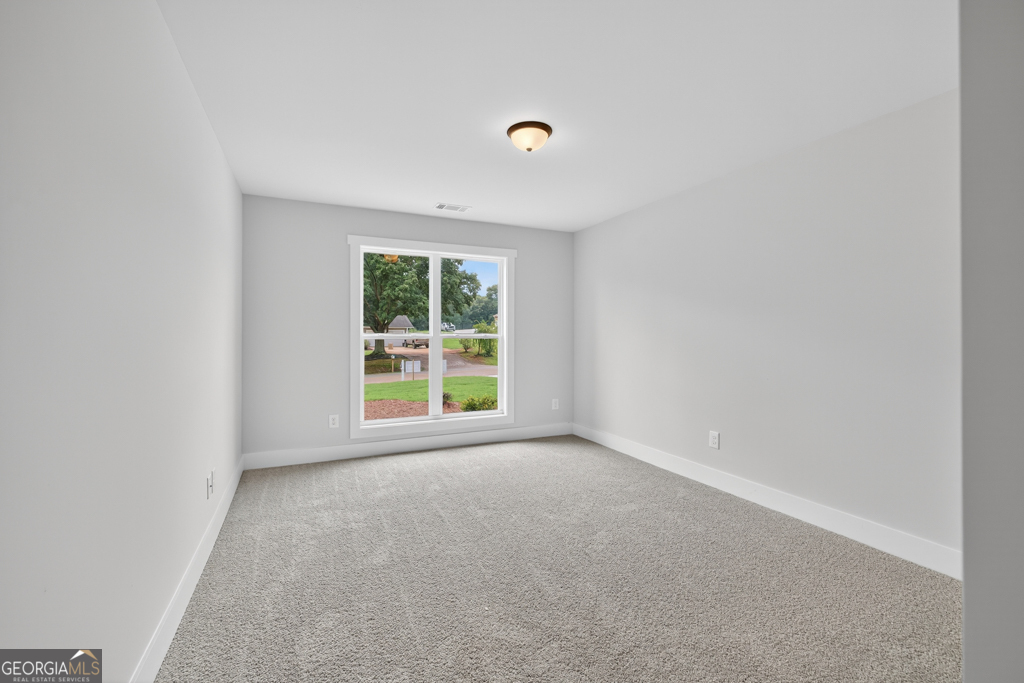 474 Oil Mill Road, Unit 11 Martin, GA 30557 - Photo 15 of 30 a view of an empty room with a window