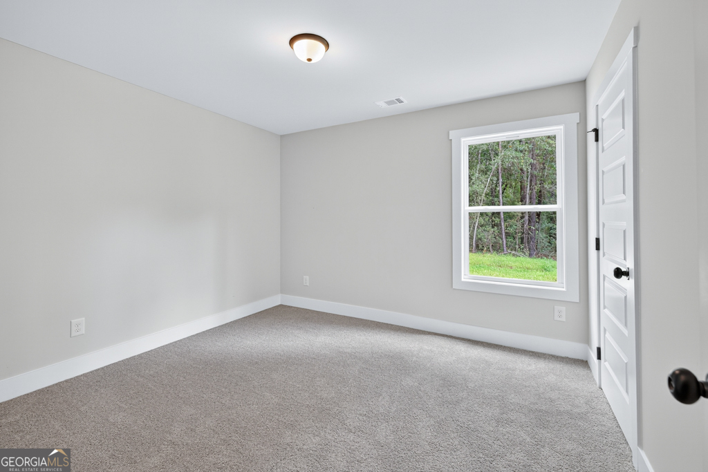 474 Oil Mill Road, Unit 11 Martin, GA 30557 - Photo 19 of 30 an empty room with windows