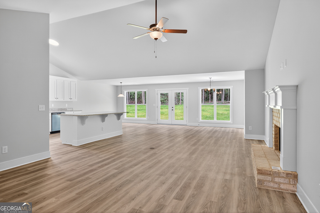 474 Oil Mill Road, Unit 11 Martin, GA 30557 - Photo 3 of 30 a view of empty room with wooden floor and fan