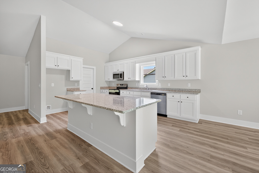 474 Oil Mill Road, Unit 11 Martin, GA 30557 - Photo 9 of 30 a kitchen with stainless steel appliances a sink a stove a refrigerator and cabinets