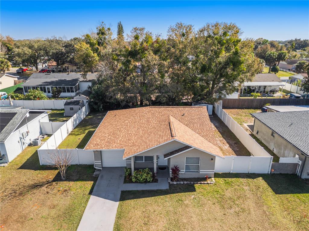 117 Pansy Court Kissimmee, FL 34743 - Photo 32 of 40 an aerial view of a house with swimming pool and furniture