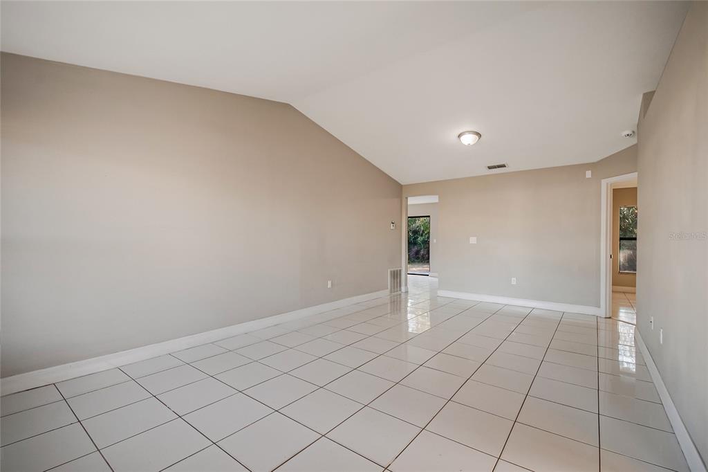 117 Pansy Court Kissimmee, FL 34743 - Photo 5 of 40 a view of an empty room