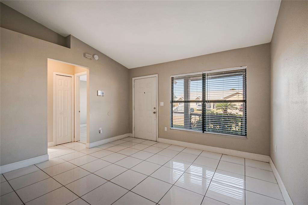 117 Pansy Court Kissimmee, FL 34743 - Photo 6 of 40 a view of an empty room with window