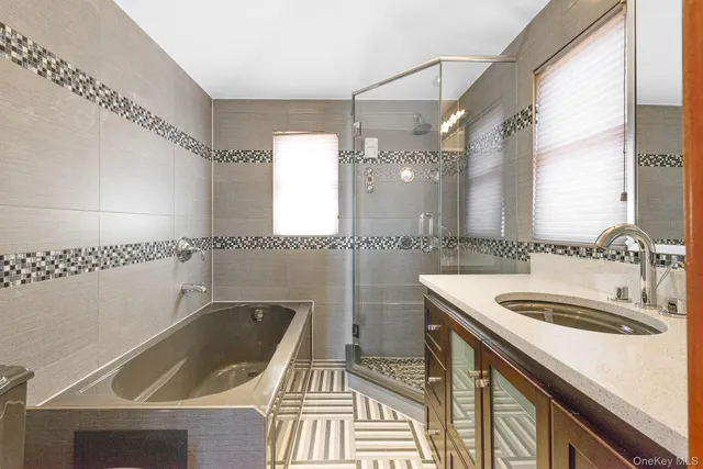 a view of a room with wooden floor and windows