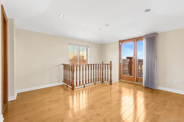 a view of roof deck with furniture
