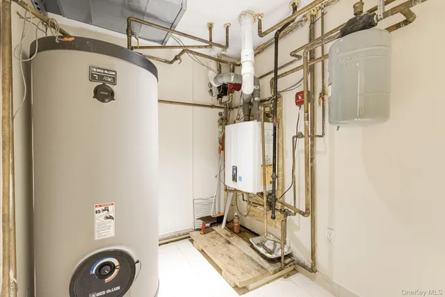 a view of a pathway with a wrought fence