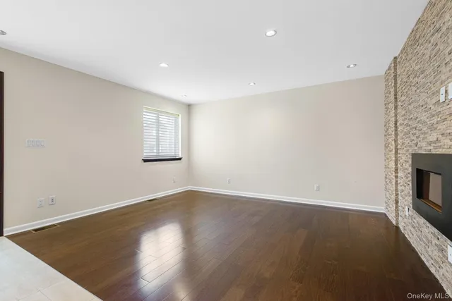 a kitchen with stainless steel appliances kitchen island granite countertop a sink and cabinets