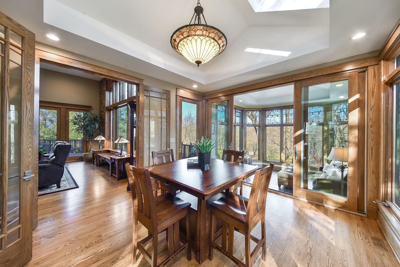 31 6n705 Il Rte Street St. Charles, IL 60175 - Photo 18 of 61 a view of a dining room with furniture wooden floor and a chandelier