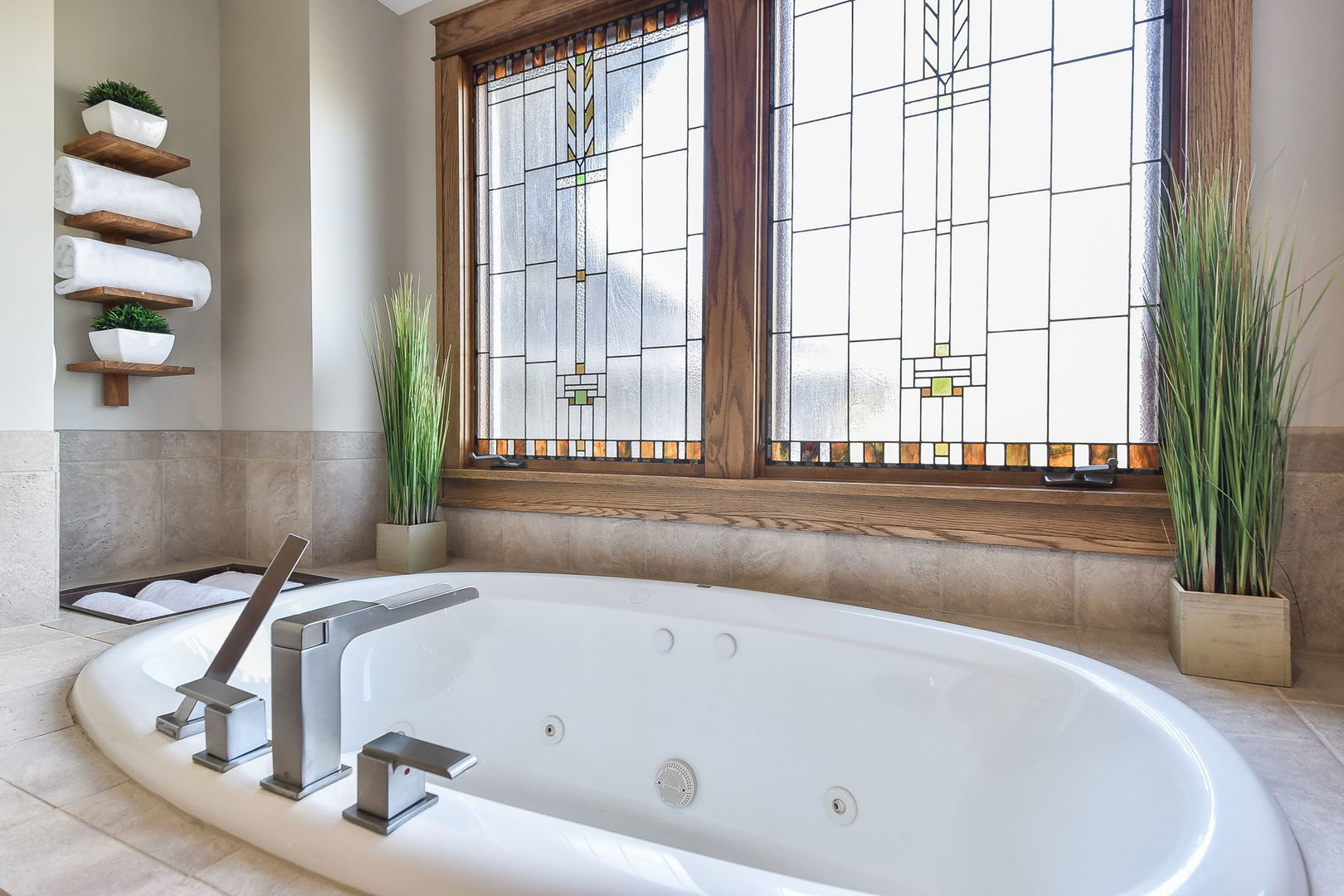 31 6n705 Il Rte Street St. Charles, IL 60175 - Photo 30 of 61 a bath tub sitting in a bathroom next to a window