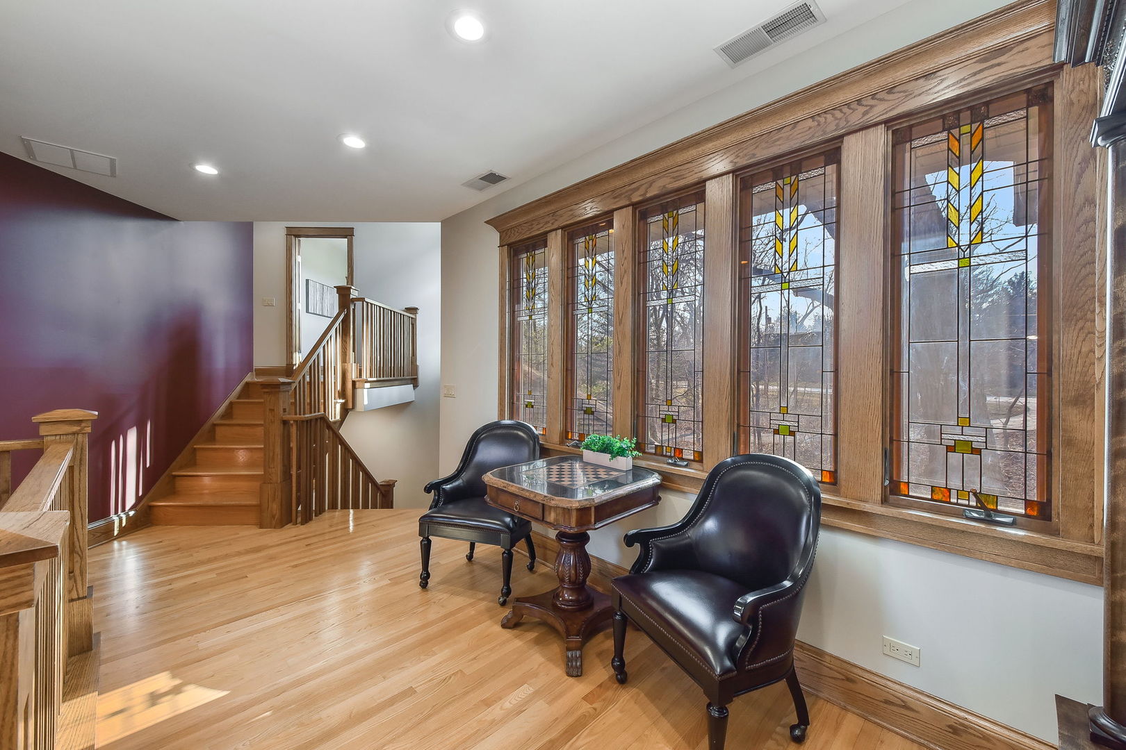31 6n705 Il Rte Street St. Charles, IL 60175 - Photo 32 of 61 a living room with furniture and floor to ceiling windows