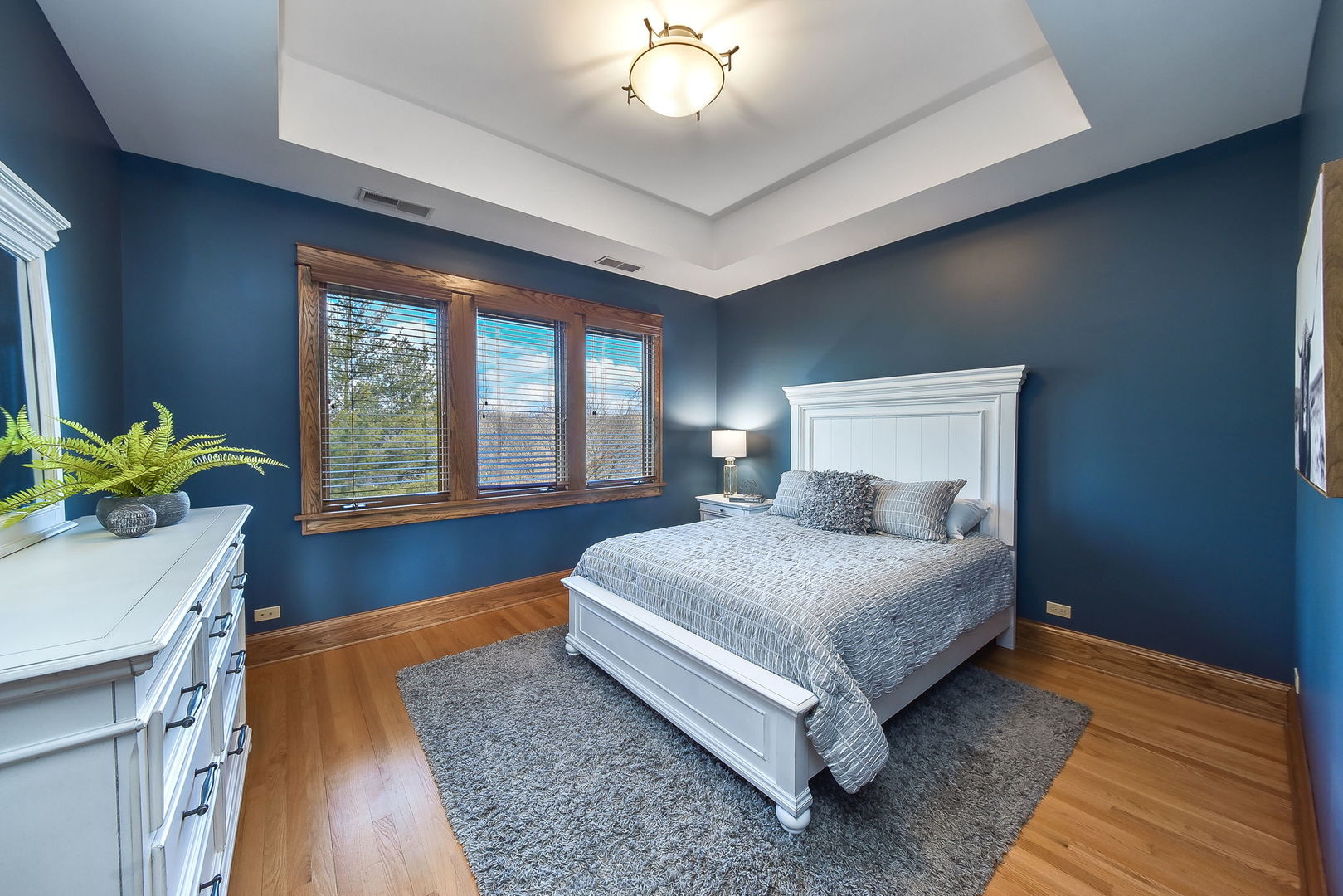 31 6n705 Il Rte Street St. Charles, IL 60175 - Photo 37 of 61 a spacious bedroom with a bed table and a window