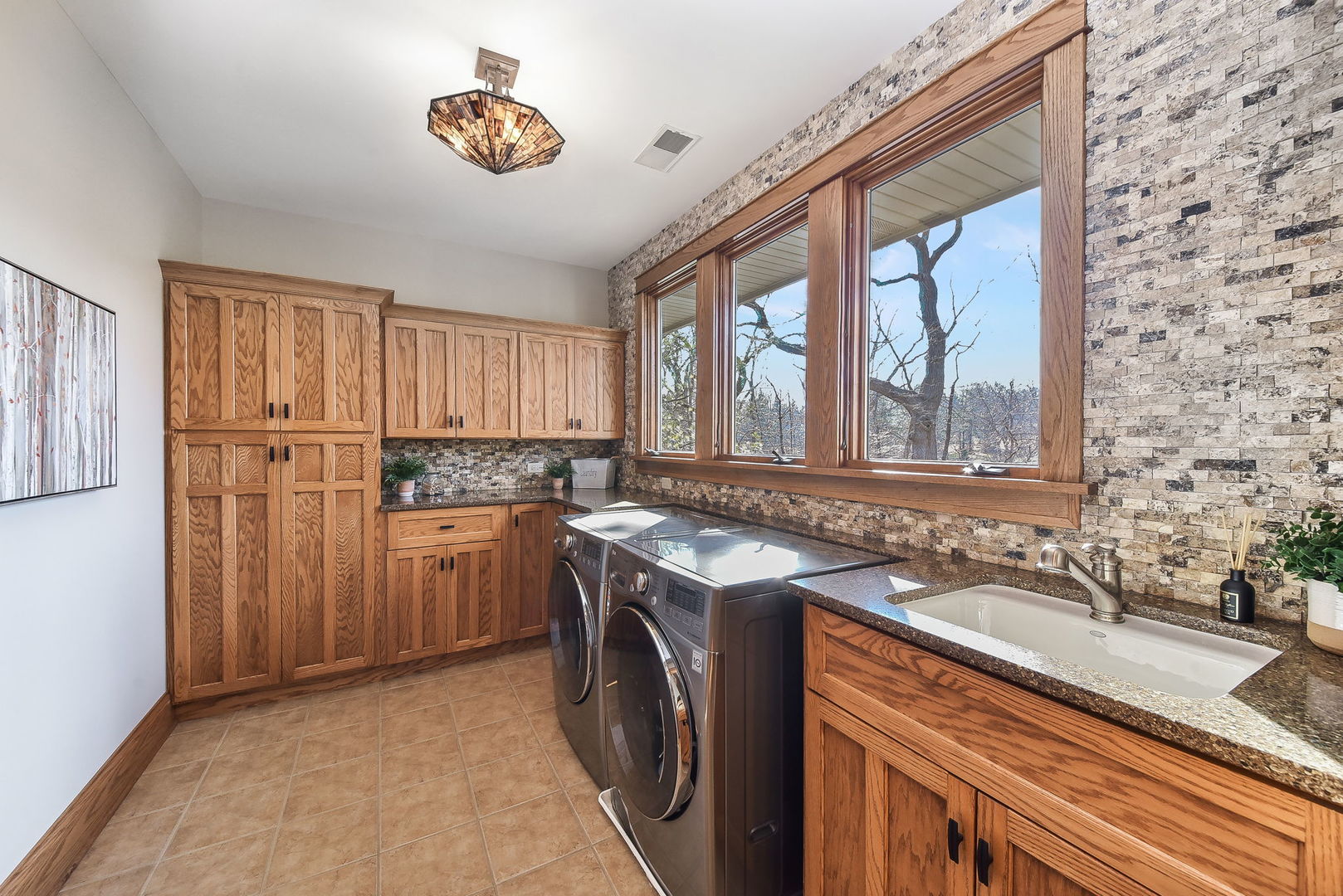 31 6n705 Il Rte Street St. Charles, IL 60175 - Photo 38 of 61 a kitchen with a sink cabinets a stove and a refrigerator