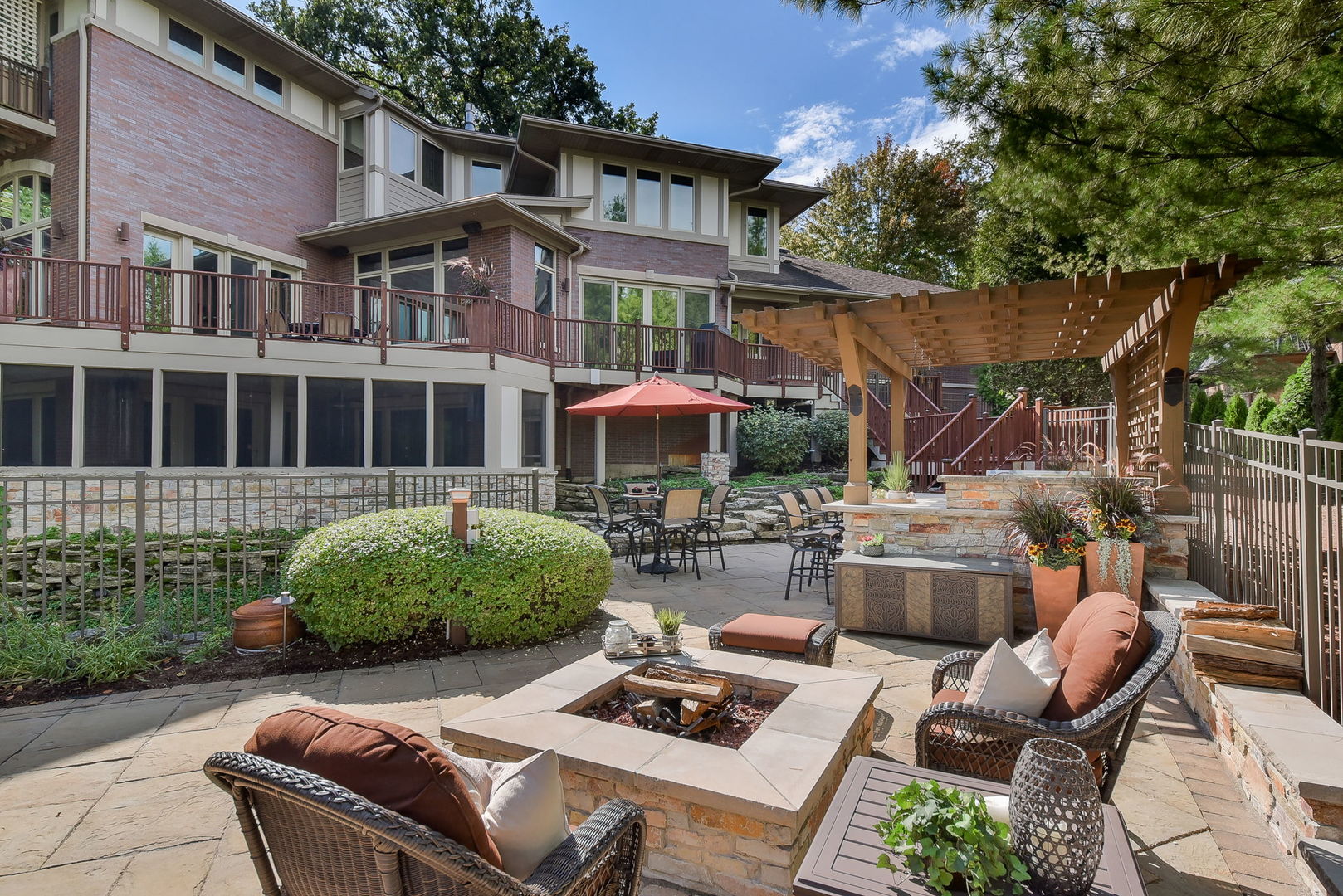 31 6n705 Il Rte Street St. Charles, IL 60175 - Photo 52 of 61 a view of a patio with couches table and chairs and potted plants