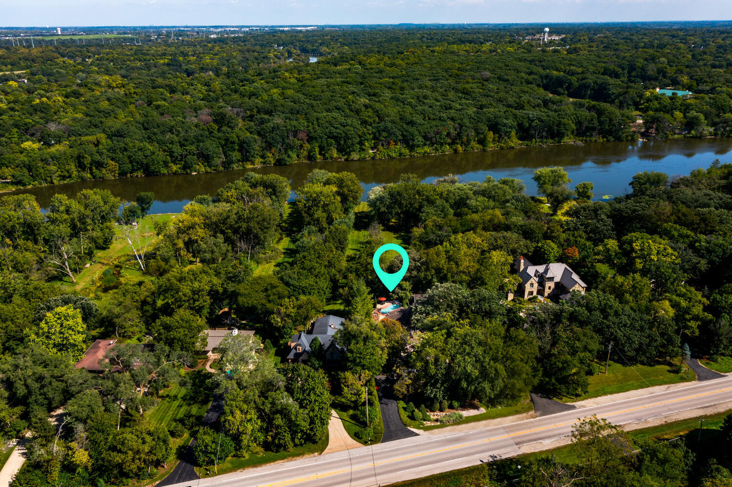 31 6n705 Il Rte Street St. Charles, IL 60175 - Photo 57 of 61 a view of a garden with a lake