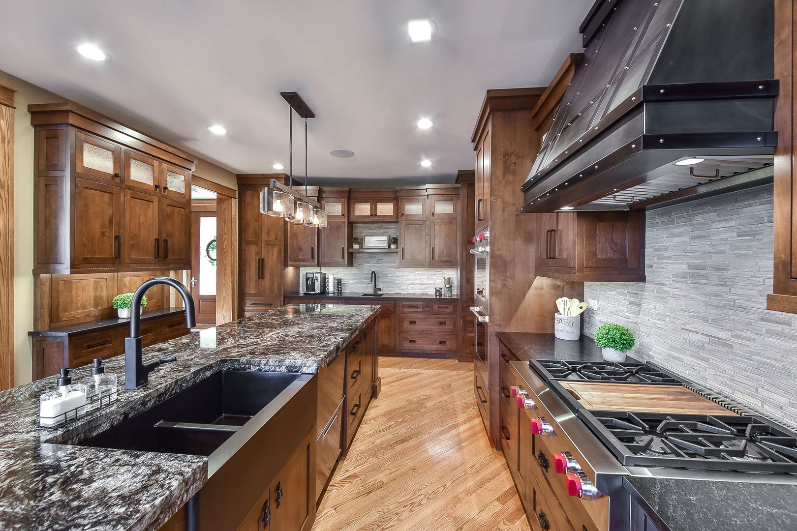 31 6n705 Il Rte Street St. Charles, IL 60175 - Photo 8 of 61 a large kitchen with stainless steel appliances granite countertop a stove and a sink