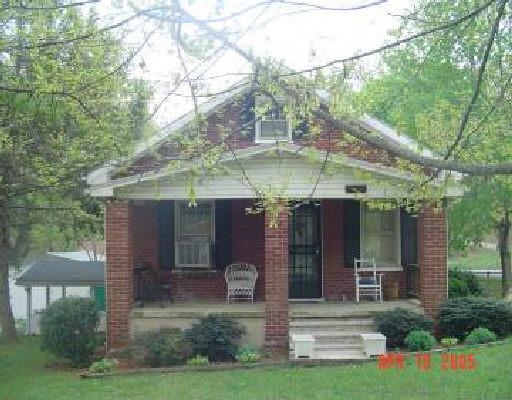 4604 Bryan Road Roanoke, VA 24014 - Photo 1 of 1 a front view of a house with garden