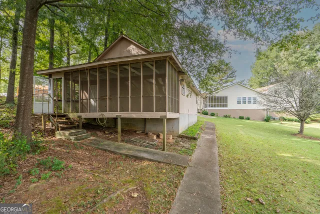 a view of balcony with wooden floor