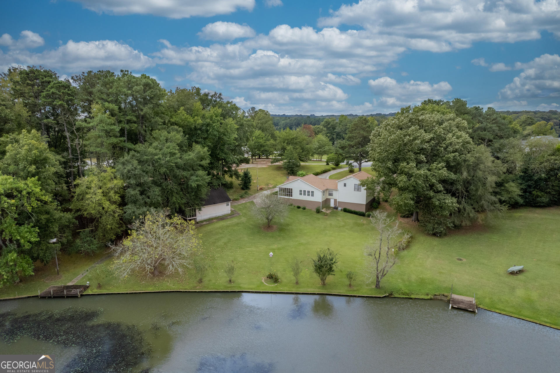 1180 Greenbriar Drive Madison, GA 30650 - Photo 53 of 54 an aerial view of a houses with yard