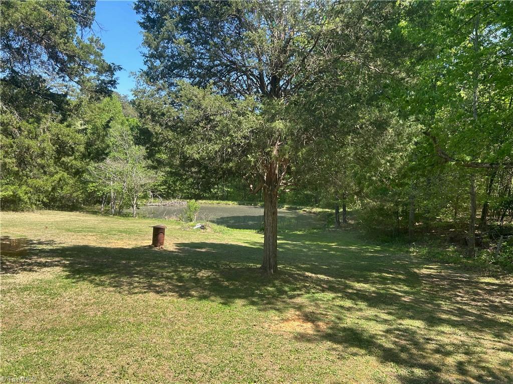 4016 High Rock Road Gibsonville, NC 27249 - Photo 25 of 41 Pond and multipurpose barrel