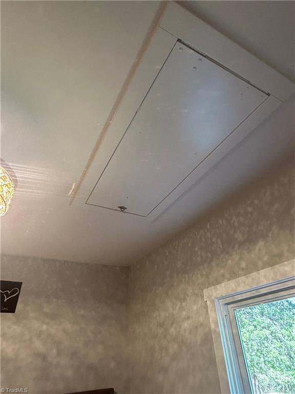 4016 High Rock Road Gibsonville, NC 27249 - Photo 26 of 41 Attic access in primary bedroom