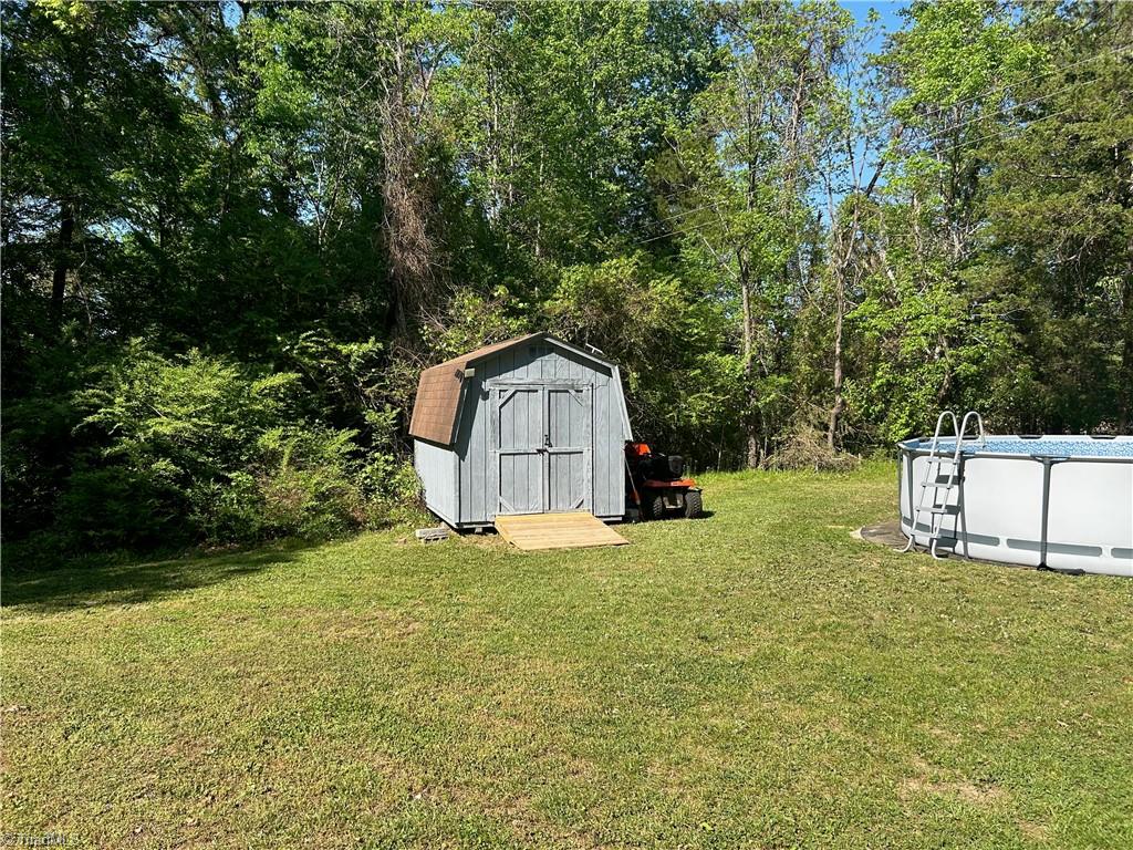 4016 High Rock Road Gibsonville, NC 27249 - Photo 31 of 41 Storage shed remains.