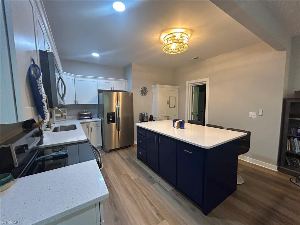 4016 High Rock Road Gibsonville, NC 27249 - Photo 7 of 41 Kitchen view showing door to mudroom