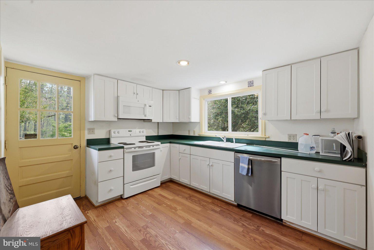 2674 5 Points Road Marshall, VA 20115 - Photo 44 of 72 Kitchen w/wood flooring & door to side deck