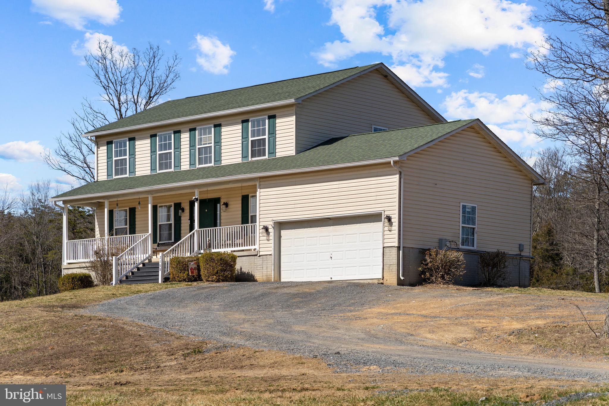 2158 Star Tannery Road Star Tannery, VA 22654 - Photo 21 of 23 a front view of a house with a yard and garage