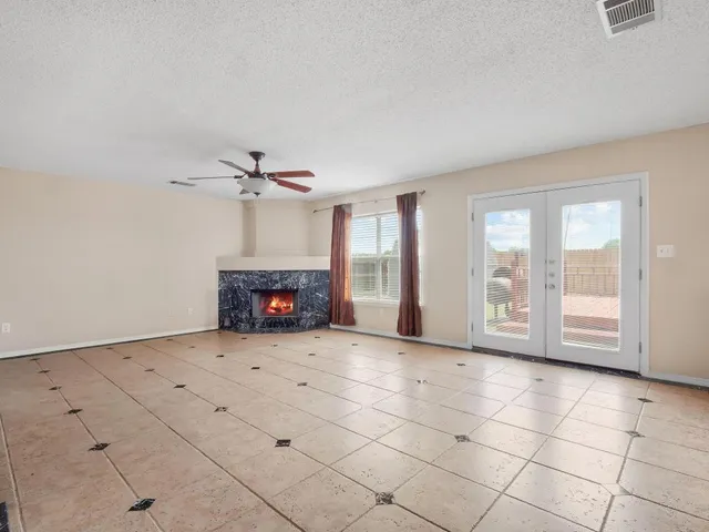 a kitchen with stainless steel appliances a stove a sink and a refrigerator