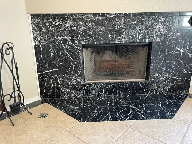 a white toilet sitting next to a bath tub