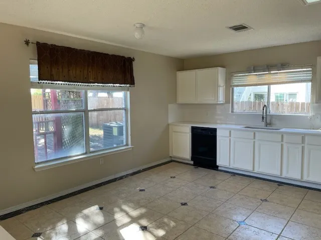 a view of a bathroom with wooden floor