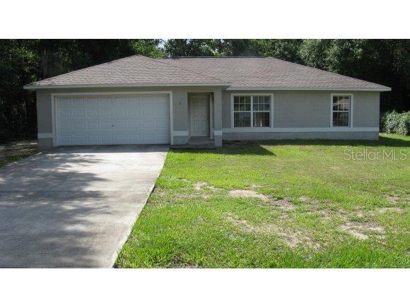 3 Spring Loop Drive Ocala, FL 34472 - Photo 1 of 1 a black and white photo of a house