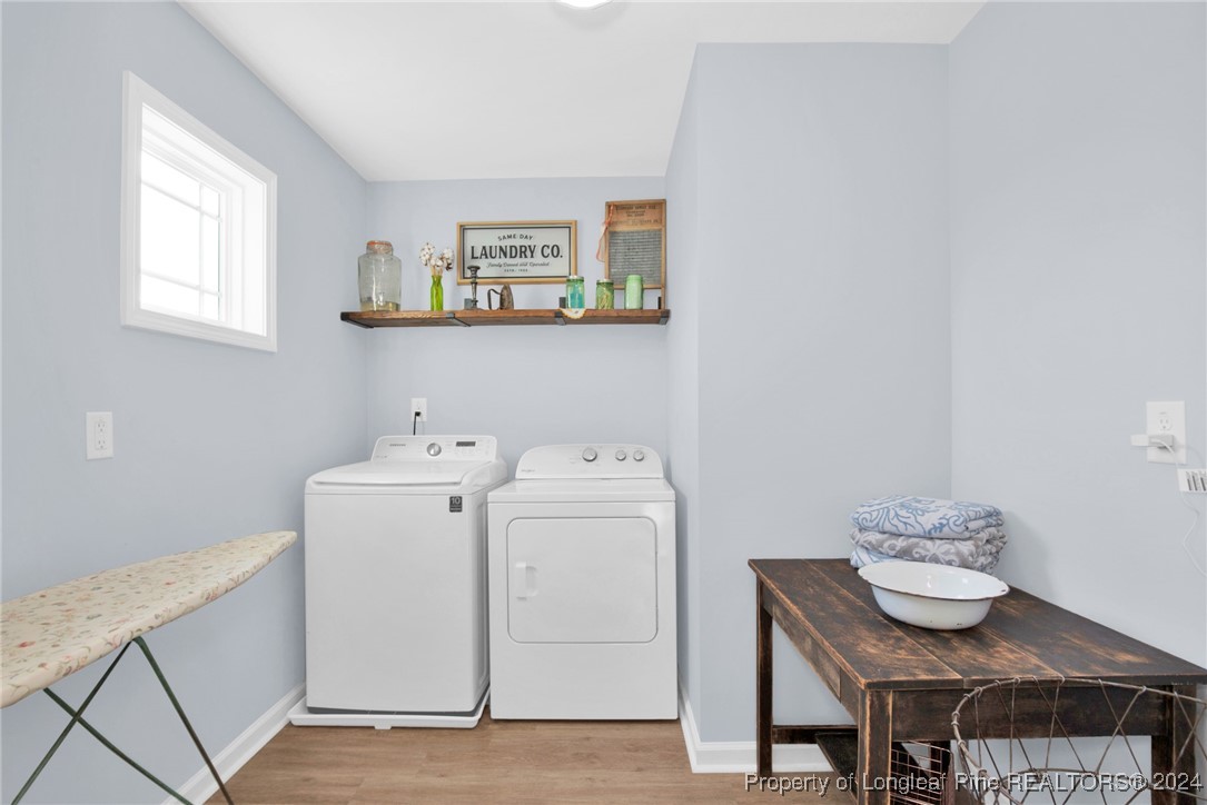 11 Rainmaker Street Linden, NC 28356 - Photo 12 of 32 a utility room with dryer and washer