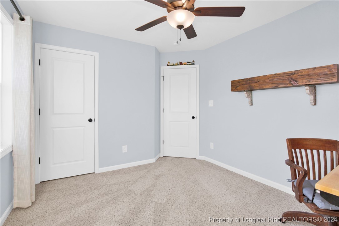11 Rainmaker Street Linden, NC 28356 - Photo 19 of 32 an empty room with windows and fan