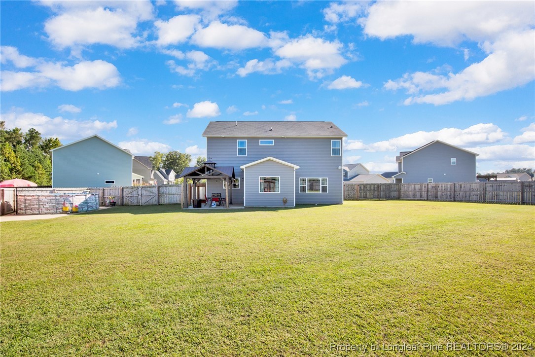 11 Rainmaker Street Linden, NC 28356 - Photo 23 of 32 a front view of house with ocean view