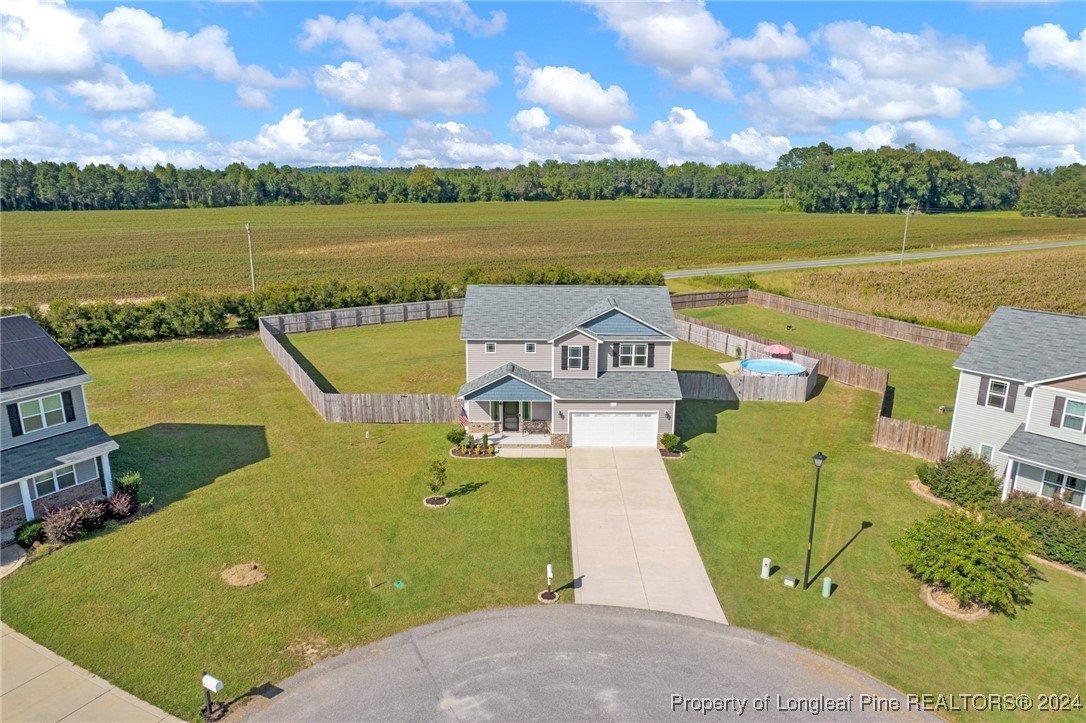 11 Rainmaker Street Linden, NC 28356 - Photo 31 of 32 an aerial view of a house with a lake view