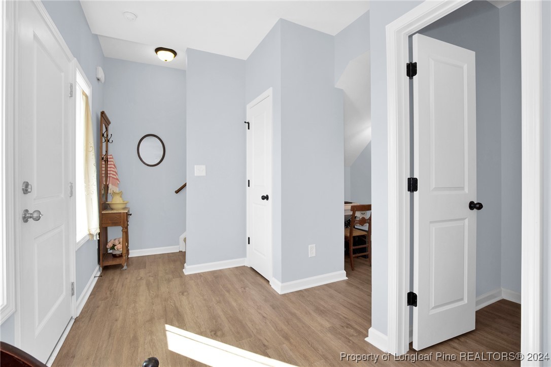 11 Rainmaker Street Linden, NC 28356 - Photo 5 of 32 a view of an entryway with wooden floor