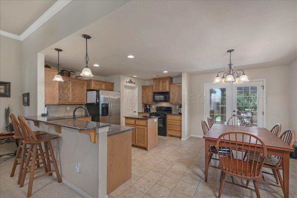 5906 South Rusk Street Amarillo, TX 79118 - Photo 9 of 34 09-Kitchen and Dining