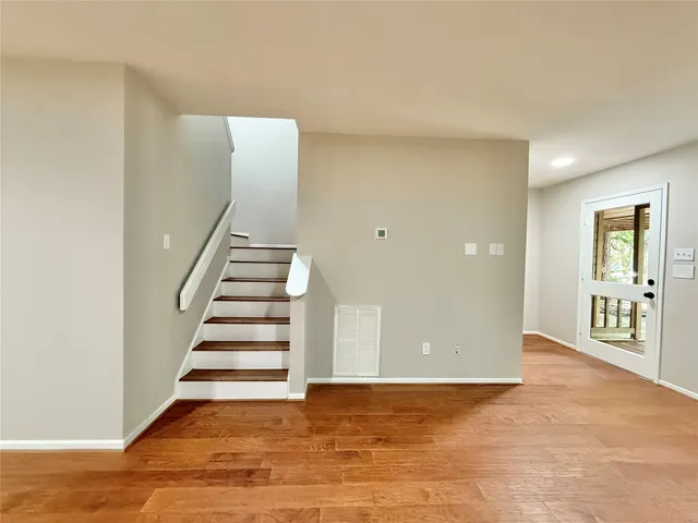 a view of an entryway with stairs