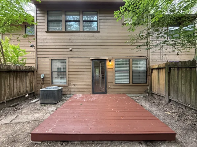 a backyard of a house with seating space