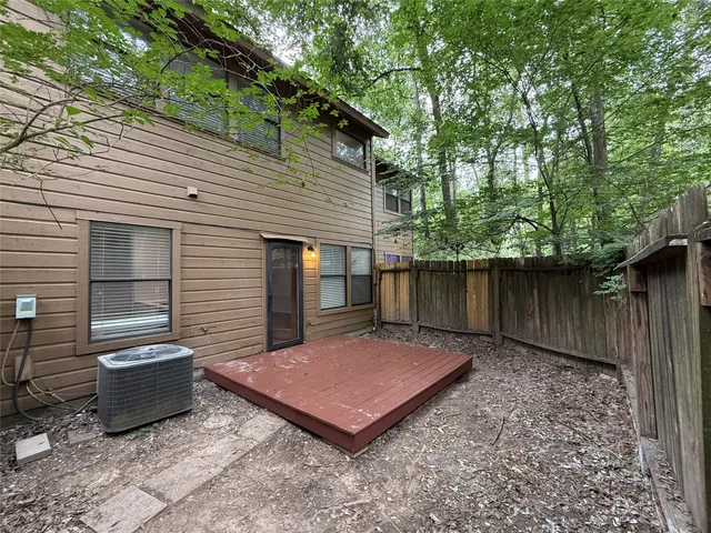 a view of a backyard with a patio