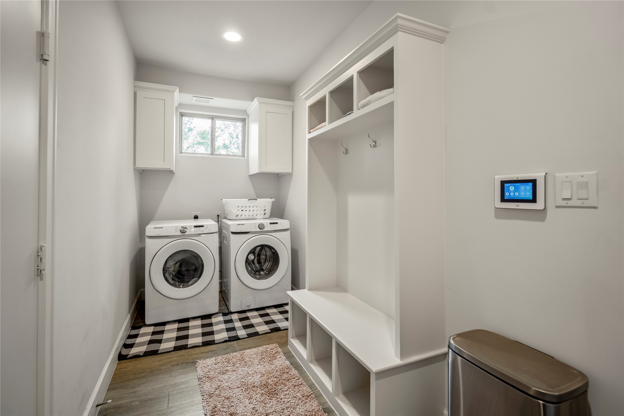 3202 Ozark Street Houston, TX 77021 - Photo 30 of 31 Laundry room located off of the garage and kitchen has storage and built-ins. Washer and dryer is included.