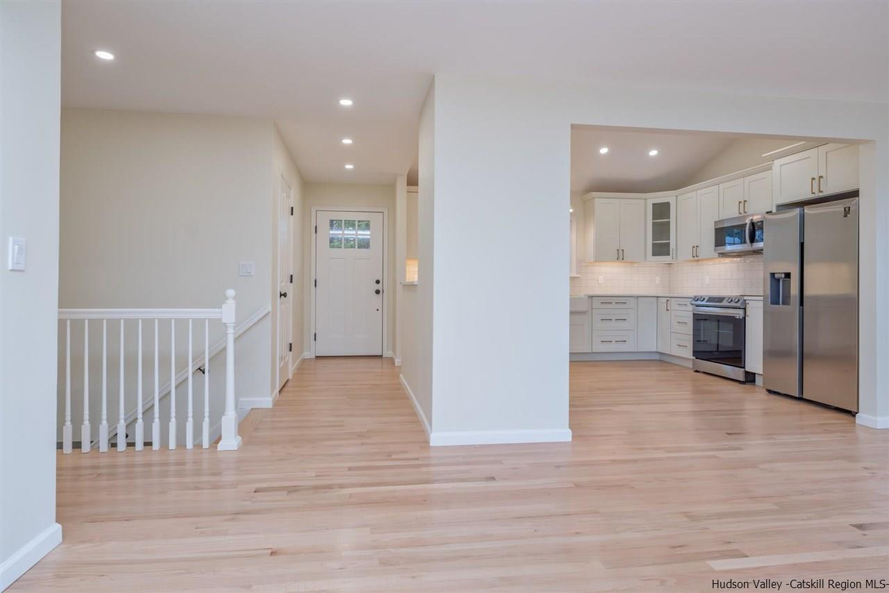 20 Robin Lane Kingston, NY 12401 - Photo 11 of 35 a view of a kitchen center island cabinets and wooden floor