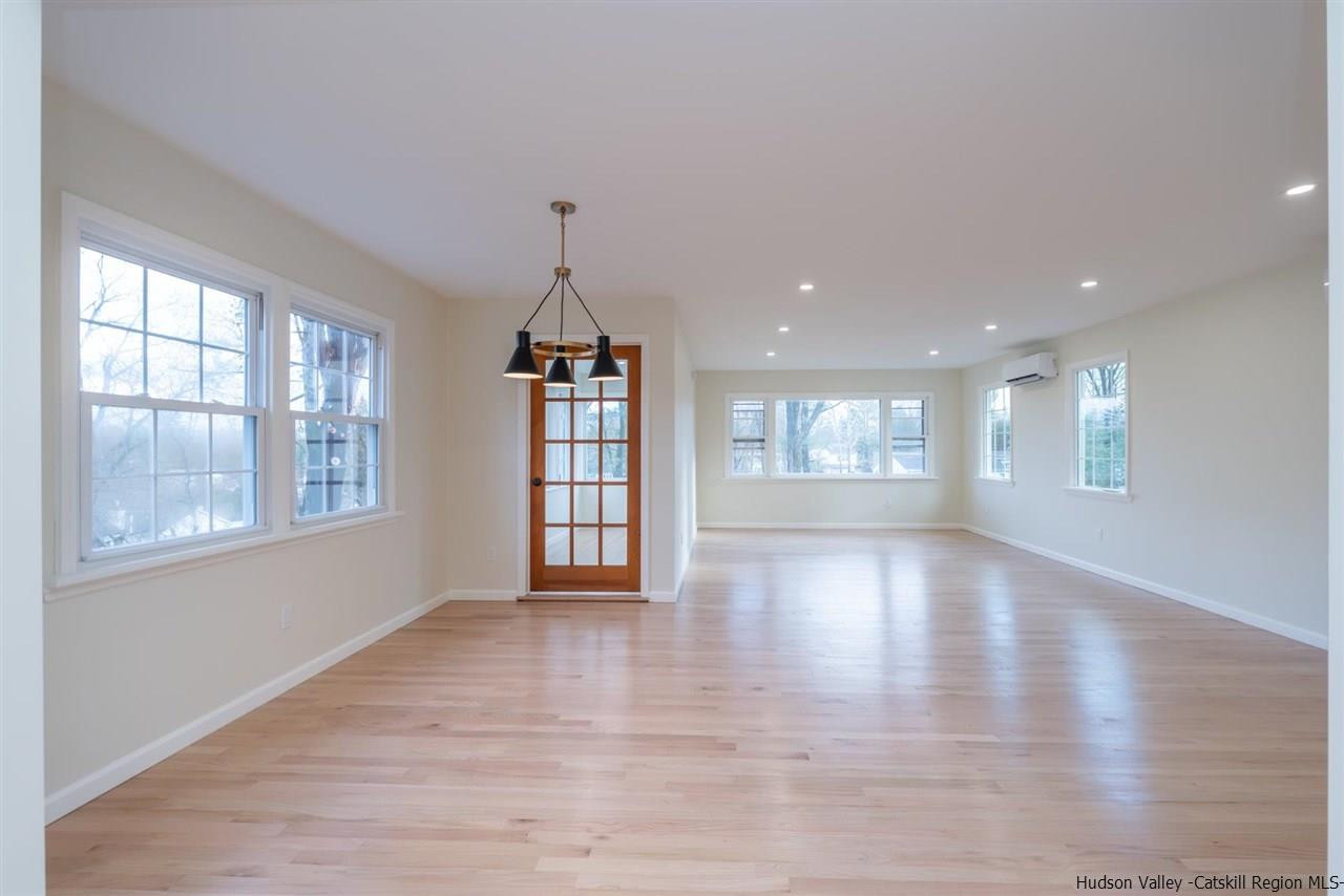 20 Robin Lane Kingston, NY 12401 - Photo 12 of 35 a view of an empty room with a window and wooden floor