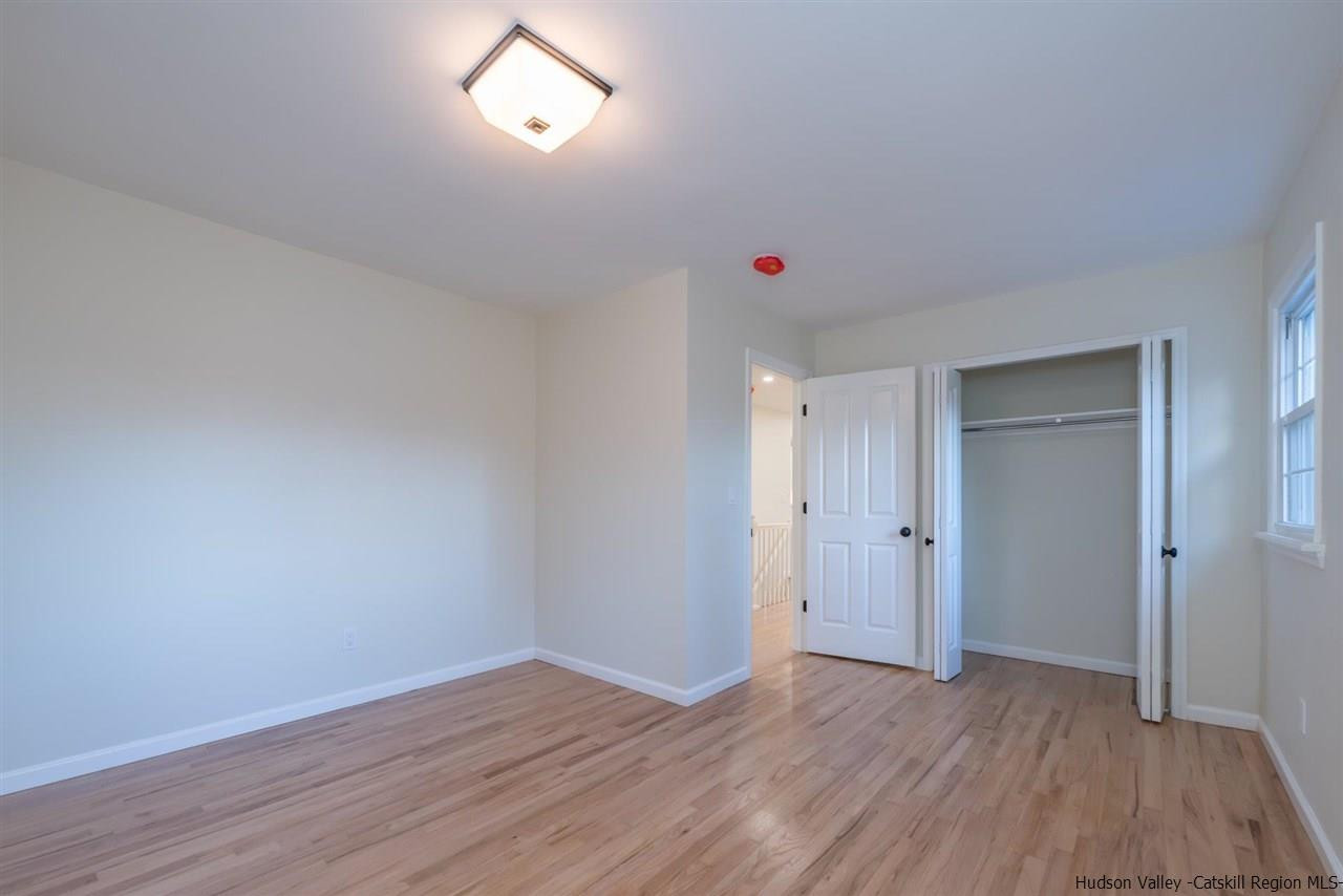 20 Robin Lane Kingston, NY 12401 - Photo 20 of 35 wooden floor in an empty room