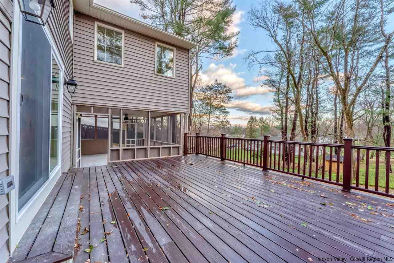 20 Robin Lane Kingston, NY 12401 - Photo 34 of 35 a view of house with deck outdoor seating and wooden floor